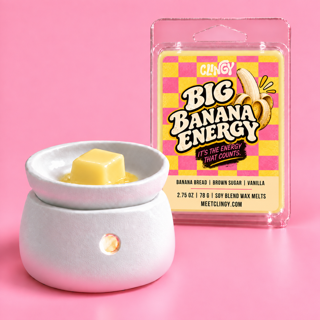 Big Banana Energy light yellow wax melt cube in a warmer