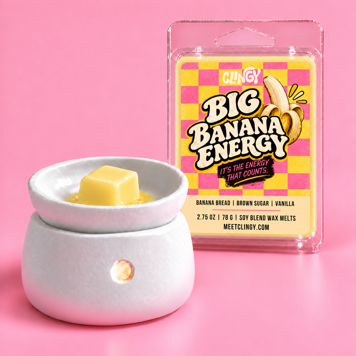 Big Banana Energy light yellow wax melt cube in a warmer