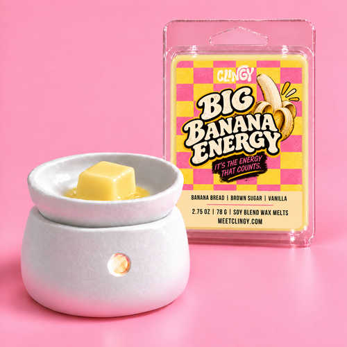 Big Banana Energy light yellow wax melt cube in a warmer