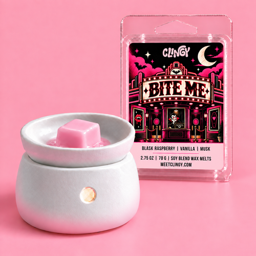 Bite Me light pink wax melt beside a white ceramic warmer