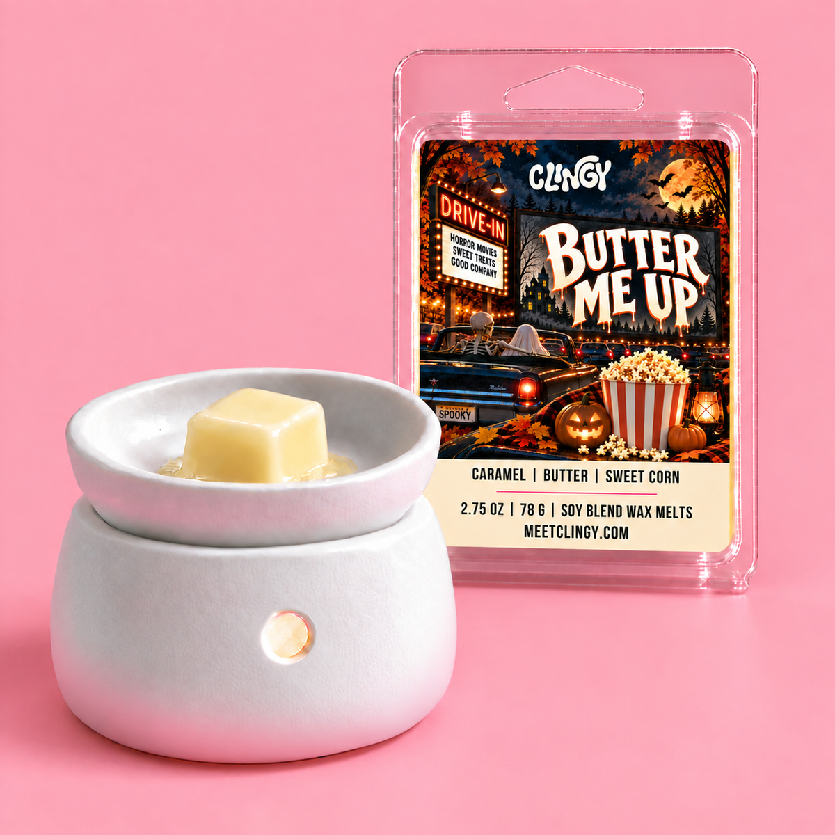Butter Me Up creamy yellow wax melt beside a white ceramic wax warmer