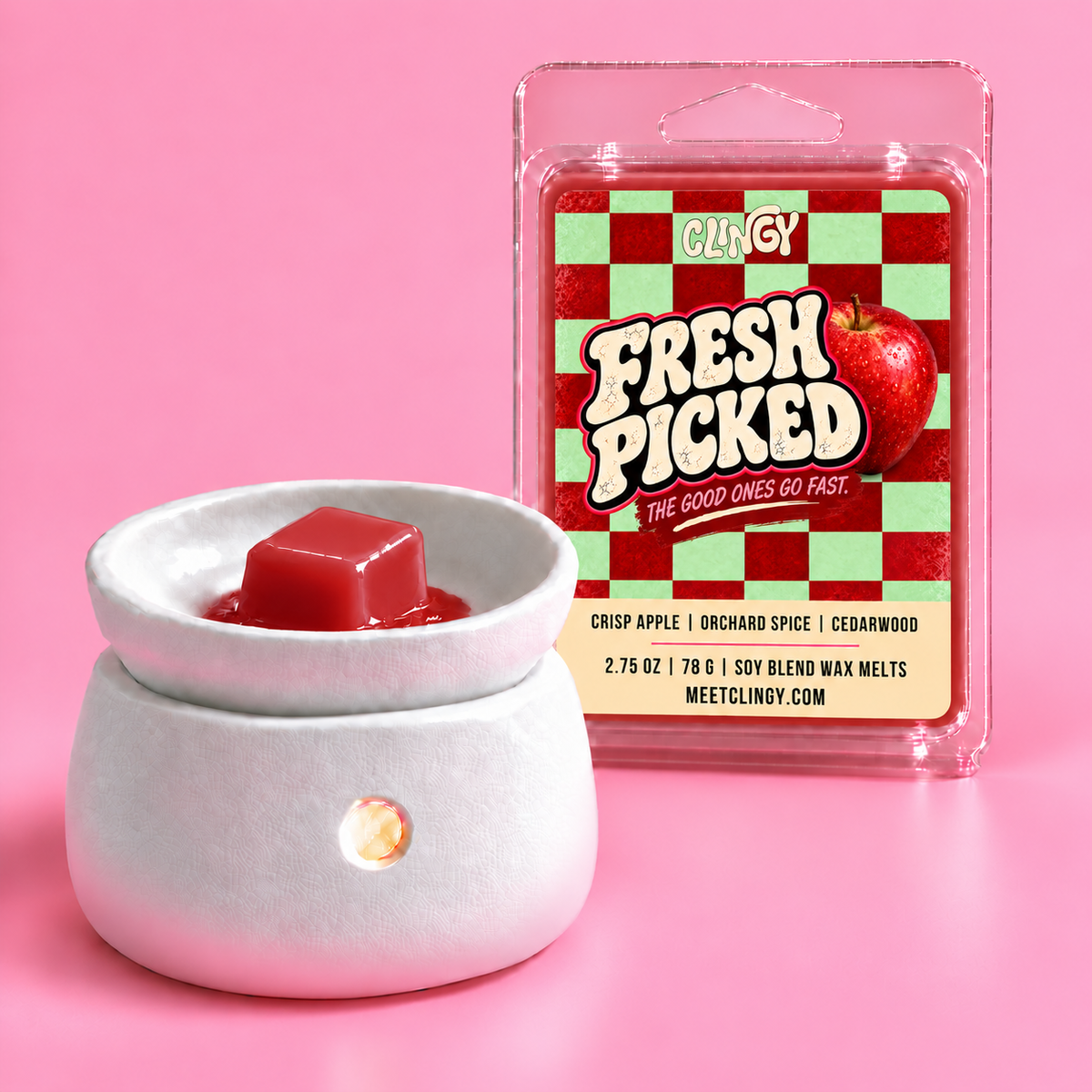 Fresh Picked red wax melt shown in a white wax warmer