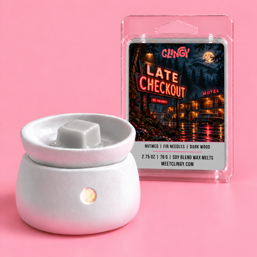 Late Checkout light gray wax melt cube in a warmer