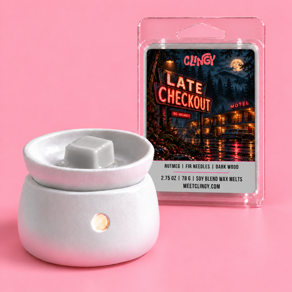 Late Checkout light gray wax melt cube in a warmer