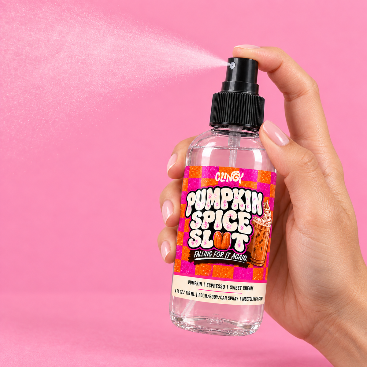 Hand spraying CLINGY Pumpkin Spice Slut room, body, and car spray