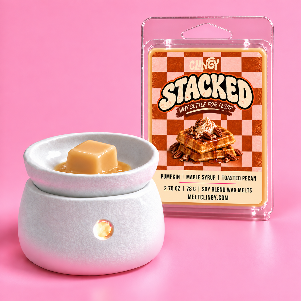 Stacked light orange wax melt cube in a white warmer